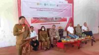 Penjabat Bupati Minahasa Dr. Jemmy Stani Kumendong M.Si saat membawakan sambutan (ist)