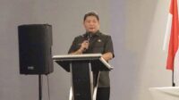 Penjabat Bupati Kabupaten Minahasa Dr. Jemmy Stani Kumendong, M.SI saat memberi sambutan pada kegiatan Kick Off Meeting Implementasi Integrasi Pelayanan Kesehatan Primer Kabupaten Minahasa Tahun 2024 (ist)