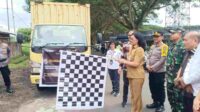 Sekretaris Daerah Kabupaten Minahasa Dr. Lynda D. Watania saat melepas pendistribusian logistik pilkada 2024 (ist)